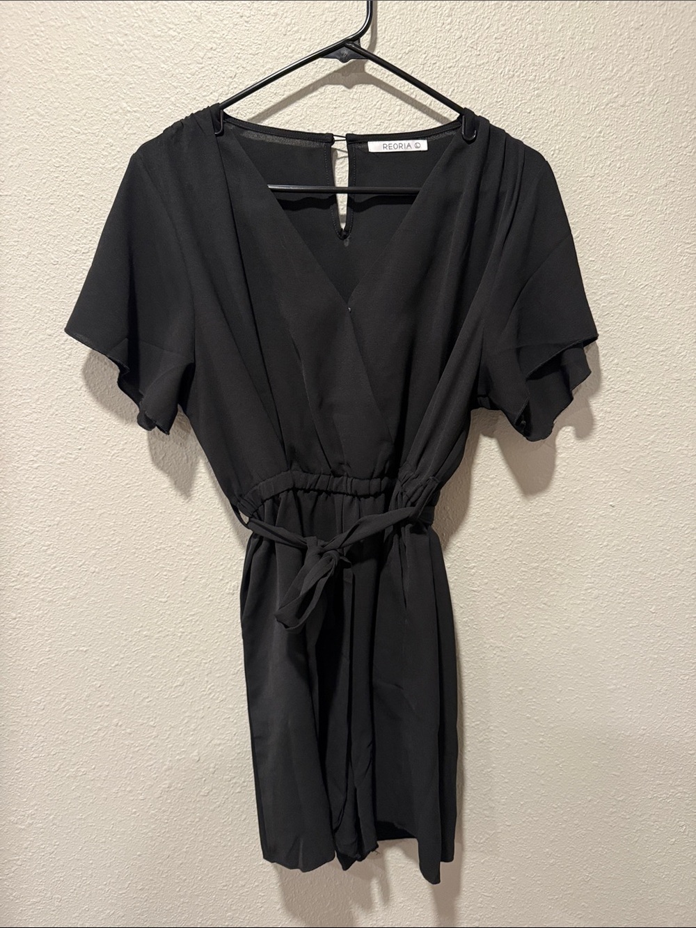 ReoRia Black Short Wrap Romper with Tie Waist and Flutter Sleeves